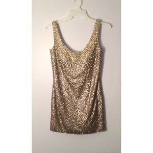 Gold, intricately beaded, short prom dress